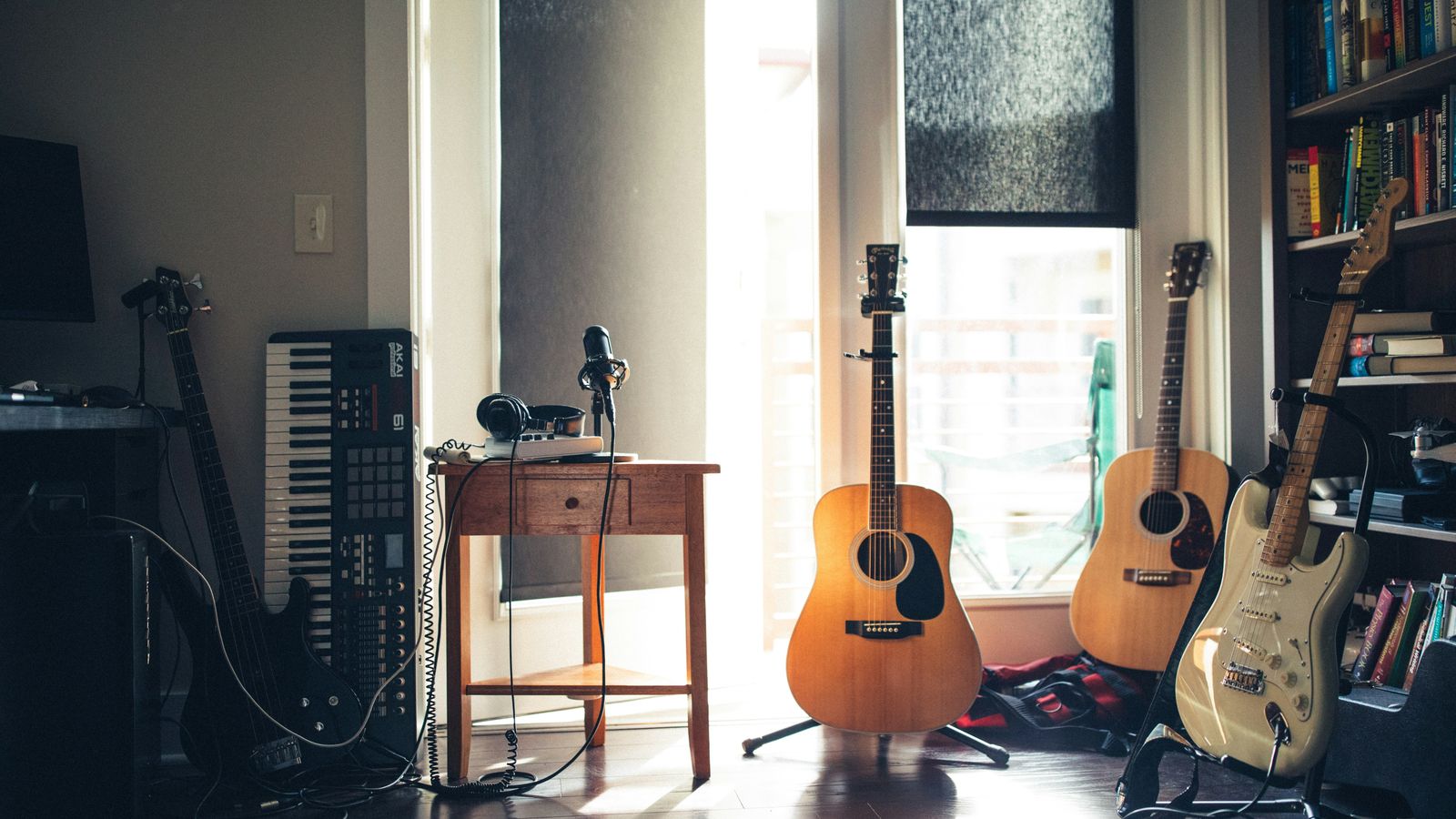 Sheet music and a guitar, ready for a new song