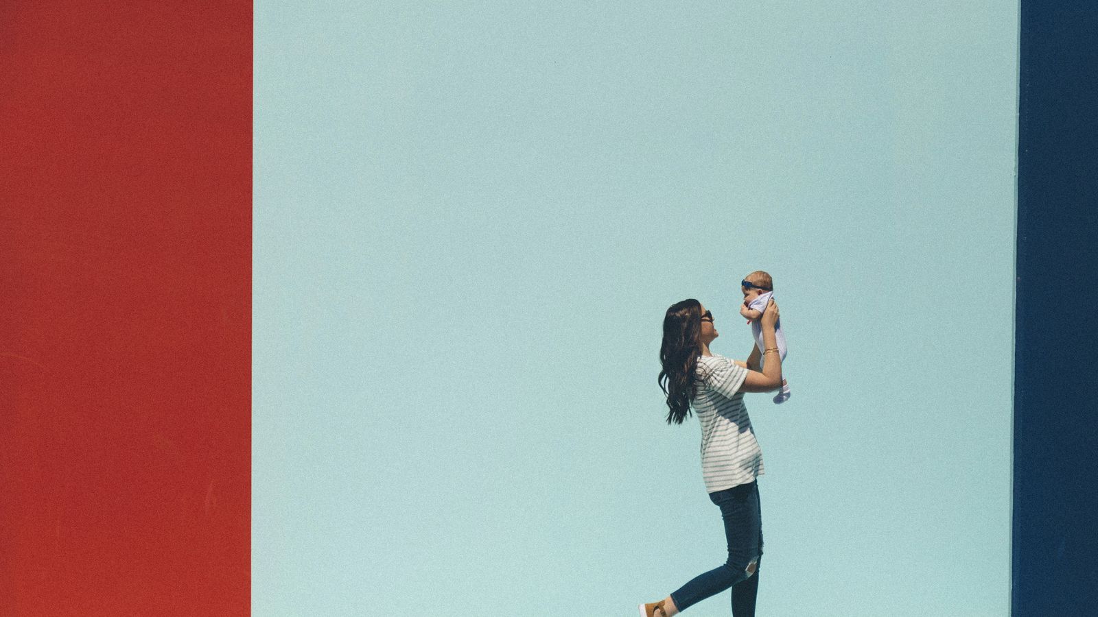 A mother holding her child